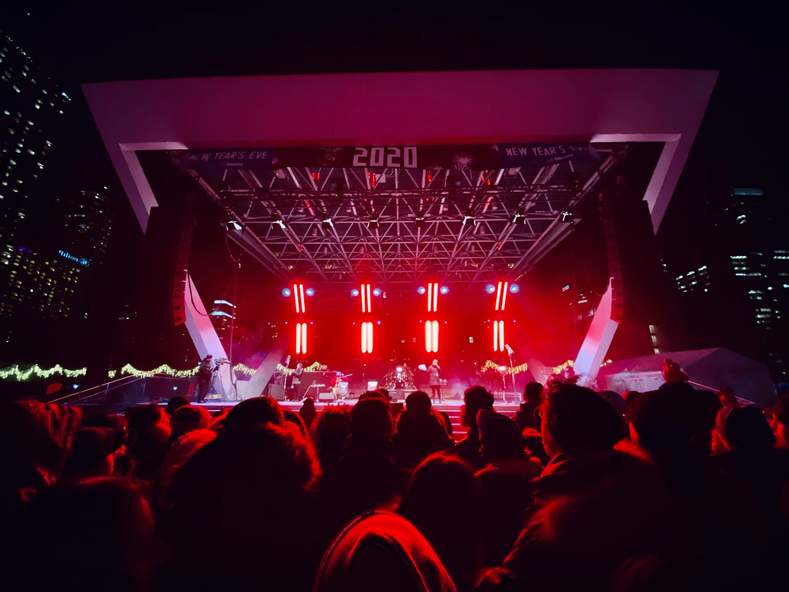 photography of people watching concert during nighttime